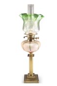 AN EDWARDIAN BRASS COLUMNAR OIL LAMP