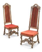 A PAIR OF CONTINENTAL 17TH CENTURY WALNUT HIGH-BACK CHAIRS
