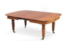 A VICTORIAN MAHOGANY WIND-OUT EXTENDING DINING TABLE