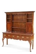 A GEORGE III STYLE YEW WOOD BANDED OAK DRESSER AND RACK