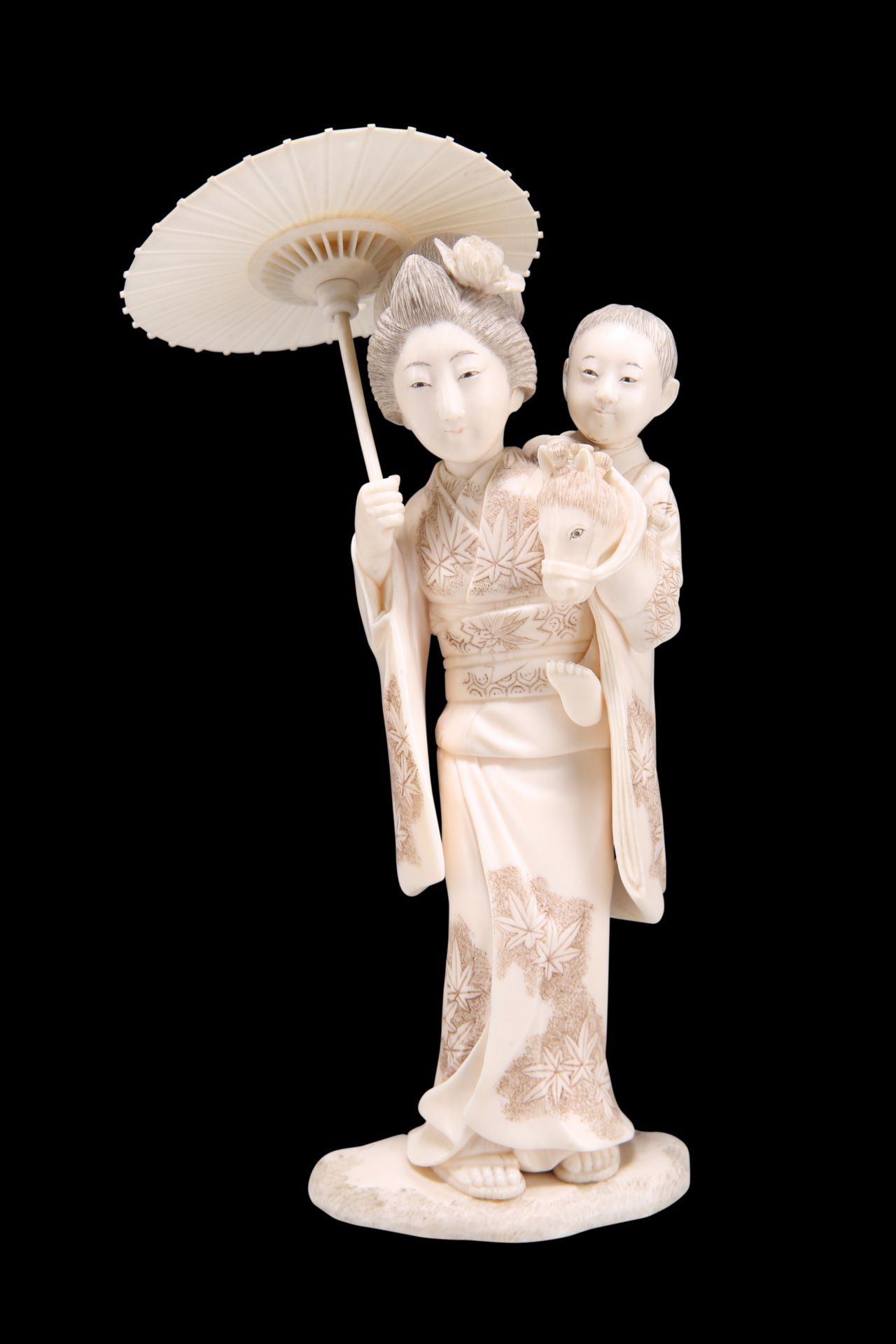 A JAPANESE MEIJI PERIOD CARVED IVORY OKIMONO