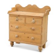 A SMALL VICTORIAN PINE CHEST OF DRAWERS