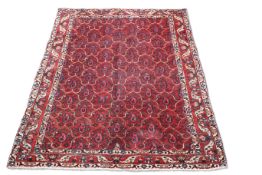 A FINELY WOVEN IRANIAN CARPET