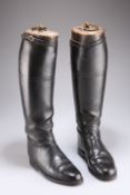 A PAIR OF LEATHER RIDING BOOTS AND FIVE VARIOUS GENTS HATS
