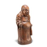 A CHINESE HARDWOOD FIGURE, QING DYNASTY