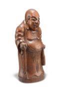 A CHINESE HARDWOOD FIGURE, QING DYNASTY