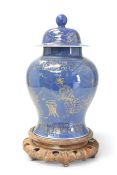 A CHINESE POWDER BLUE AND GILT VASE AND COVER, QING DYNASTY