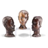 THREE AFRICAN HEAD CARVINGS