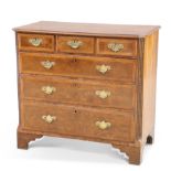 A WALNUT AND OAK CHEST OF DRAWERS, 18TH CENTURY AND LATER