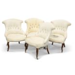 A SET OF FOUR VICTORIAN WALNUT AND UPHOLSTERED SALON CHAIRS