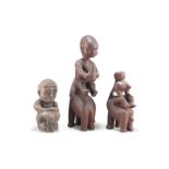 THREE TRIBAL CARVED FIGURES