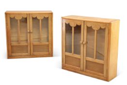 A PAIR OF ART DECO OAK BOOKCASES