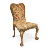 A GEORGE II STYLE WALNUT, PARCEL-GILT AND NEEDLEWORK UPHOLSTERED SIDE CHAIR