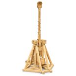 A WOODEN MODEL OF A TREBUCHET