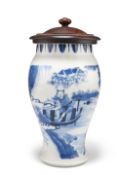 A CHINESE TRANSITIONAL STYLE BLUE AND WHITE VASE