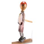 A RARE CARVED WOOD AND TINPLATE PATENTED 'MR JOLLYBOY'