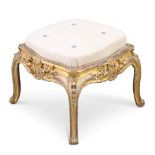 A 19TH CENTURY CARVED AND GILDED STOOL