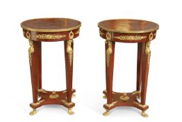 A PAIR OF EMPIRE STYLE BRASS-MOUNTED MAHOGANY GUÉRIDONS