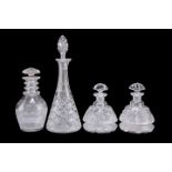 A SMALL STUART CRYSTAL CUT GLASS DECANTER AND THREE OTHER DECANTERS