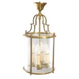 A PERIOD STYLE FOUR-GLASS BRASS HANGING LANTERN