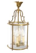 A PERIOD STYLE FOUR-GLASS BRASS HANGING LANTERN
