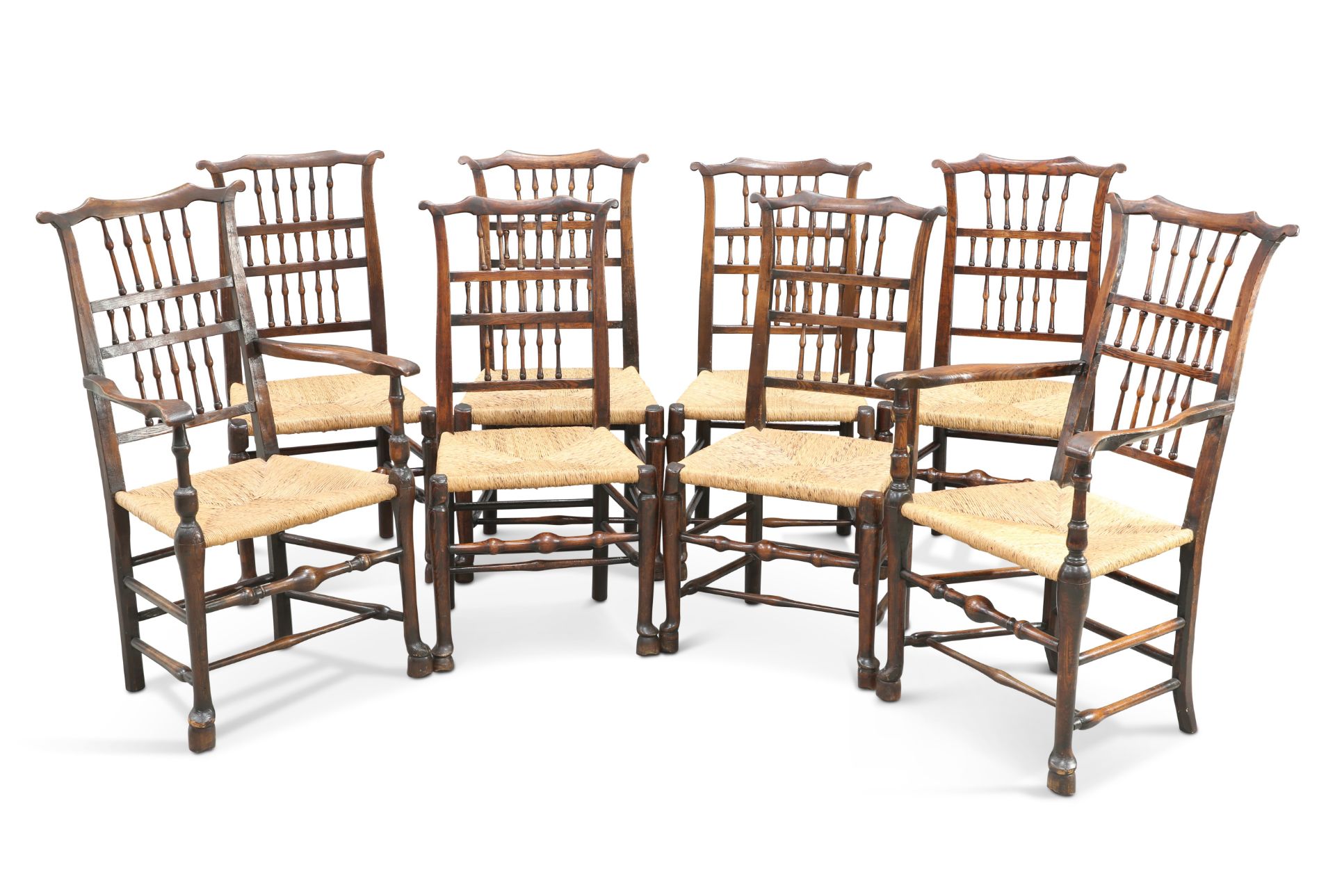 A SET OF EIGHT ELM AND RUSH SEATED DINING CHAIRS, CHESHIRE REGION, CIRCA 1820
