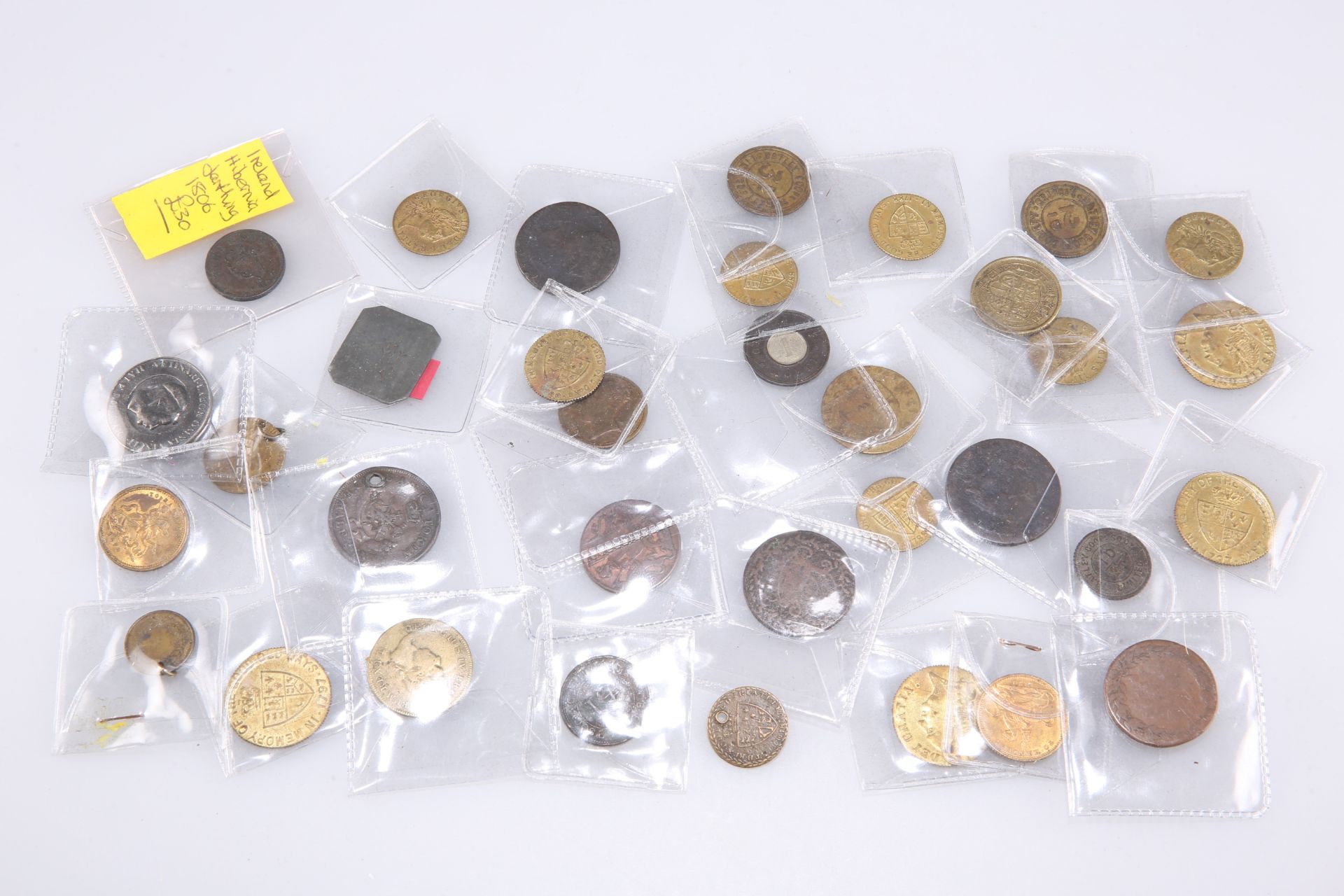 A COLLECTION OF GEORGIAN AND LATER TOKENS