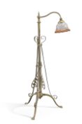 AN ART NOUVEAU BRASS TELESCOPIC STANDARD LAMP