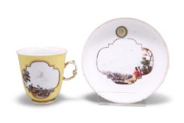 AN 18TH CENTURY MEISSEN YELLOW GROUND CUP AND SAUCER