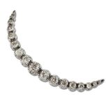 A DIAMOND CRESCENT BROOCH