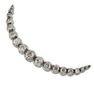 A DIAMOND CRESCENT BROOCH