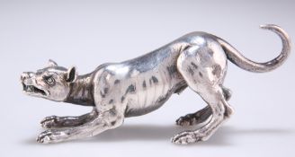 A WHITE METAL MODEL OF A HOUND