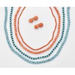 A PAIR OF CORAL DOUBLE CUFFLINKS, TWO CORAL NECKLACES AND TWO STRANDS OF BEADS