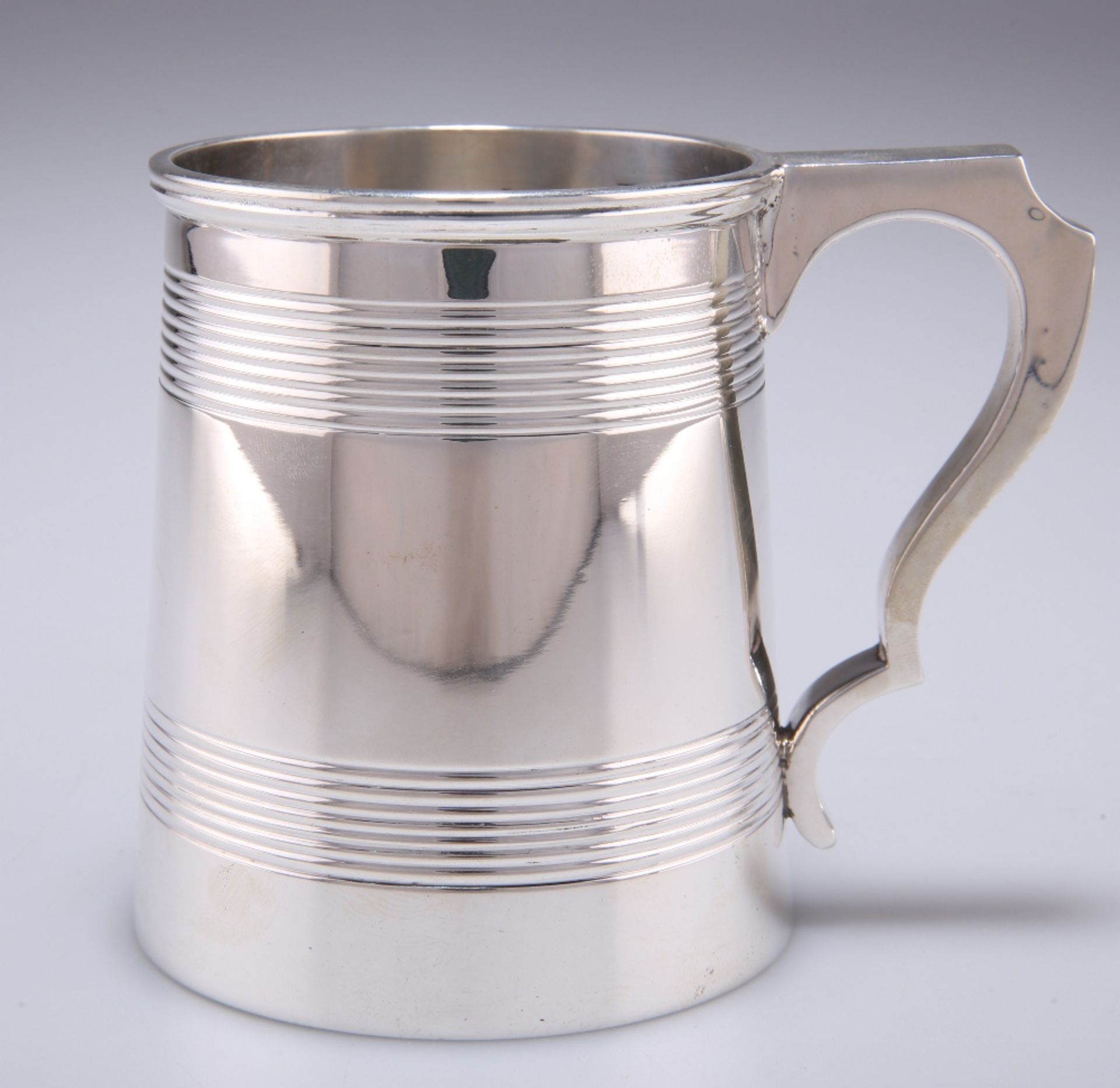 A GEORGE V SILVER MUG