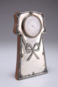 AN EDWARDIAN SILVER-MOUNTED BAROMETER