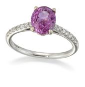 AN 18 CARAT WHITE GOLD PINK SAPPHIRE AND DIAMOND RING