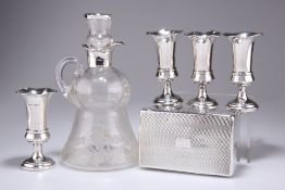 AN EDWARDIAN SILVER-MOUNTED ETCHED GLASS WHISKY JUG