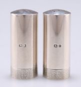 A PAIR OF ELIZABETH II SILVER SALT AND PEPPER POTS