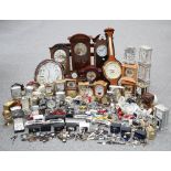 A LARGE COLLECTION OF CLOCKS AND WATCHES FROM A WATCH REPAIR SHOP
