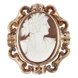 A VICTORIAN SHELL CAMEO AND HAIRWORK BROOCH