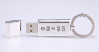 AN ELIZABETH II SILVER USB STICK KEYRING