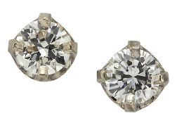 A PAIR OF SOLITAIRE DIAMOND EARRINGS