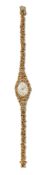 A LADY'S 18 CARAT GOLD TEWOR BRACELET WATCH