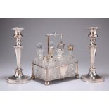 A PAIR OF 19TH CENTURY SILVER-PLATED CANDLESTICKS