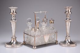 A PAIR OF 19TH CENTURY SILVER-PLATED CANDLESTICKS