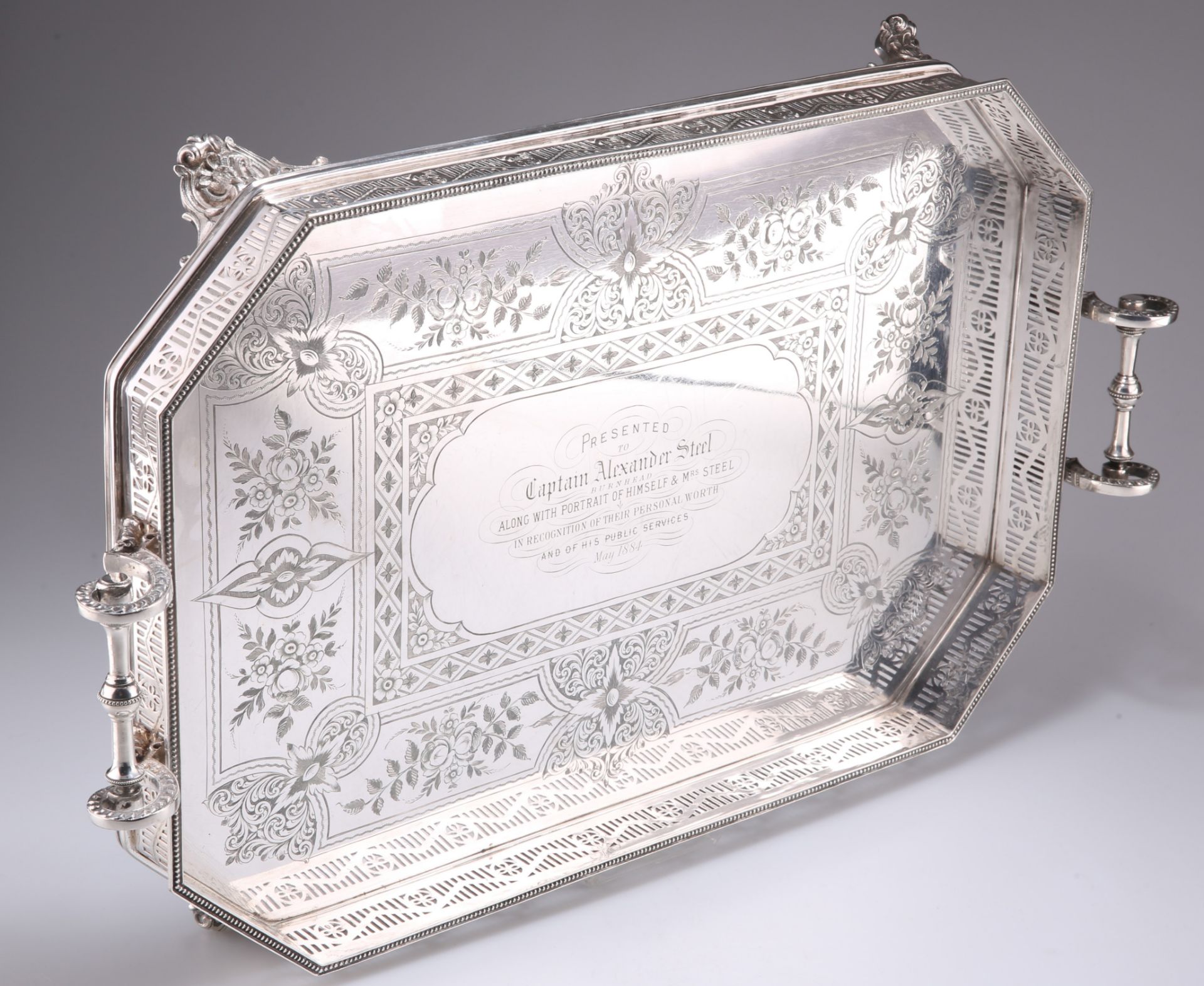 A LARGE VICTORIAN SILVER-PLATED TWO-HANDLED GALLERIED TRAY