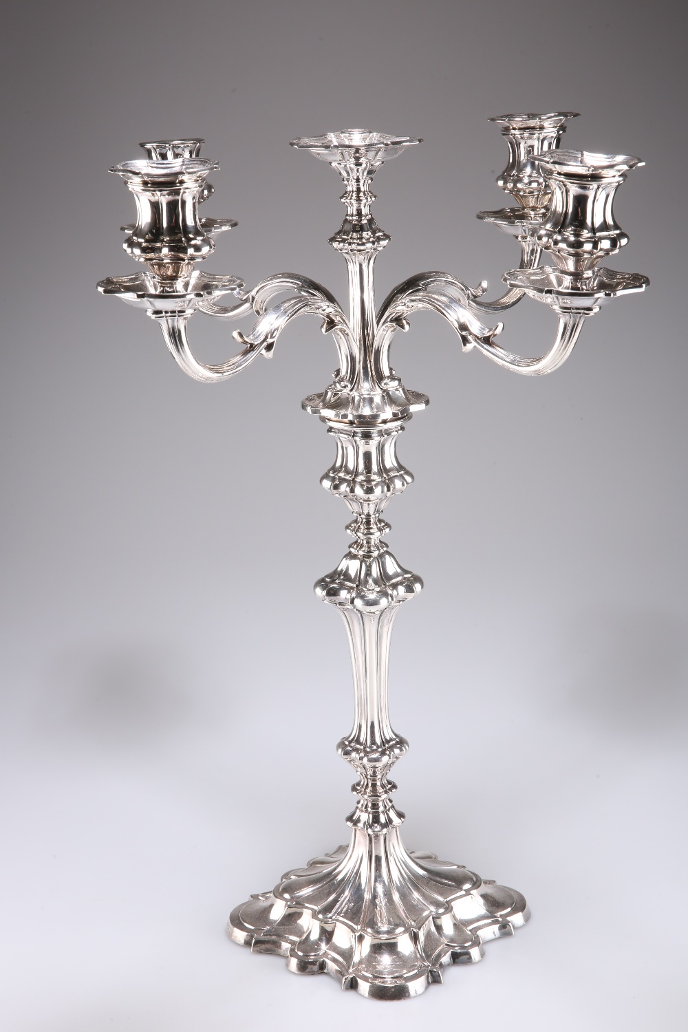 A LARGE VICTORIAN SILVER-PLATED CANDELABRUM