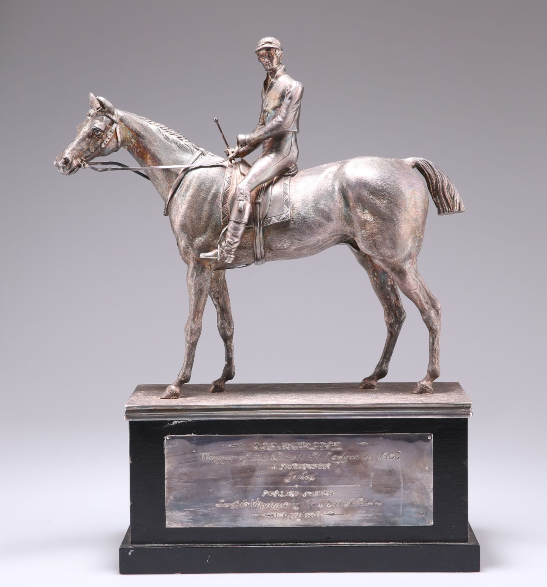 A SILVER-PLATED MODEL OF THE THOROUGHBRED RACEHORSE “MARGRAVE” WITH JOCKEY UP