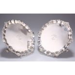 A PAIR OF GEORGE II SILVER WAITERS