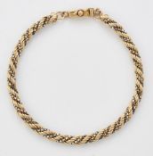 A 9 CARAT BI-COLOUR GOLD BRACELET